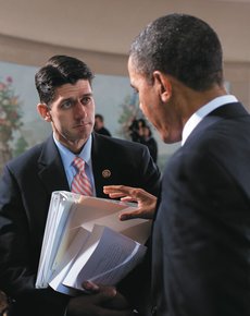 Congressman Paul Ryan presenting a stack of lies to President Obama.