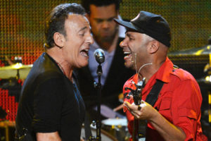 Bruce Springsteen and Tom Morello are direct descendants of Seeger's folk tradition.